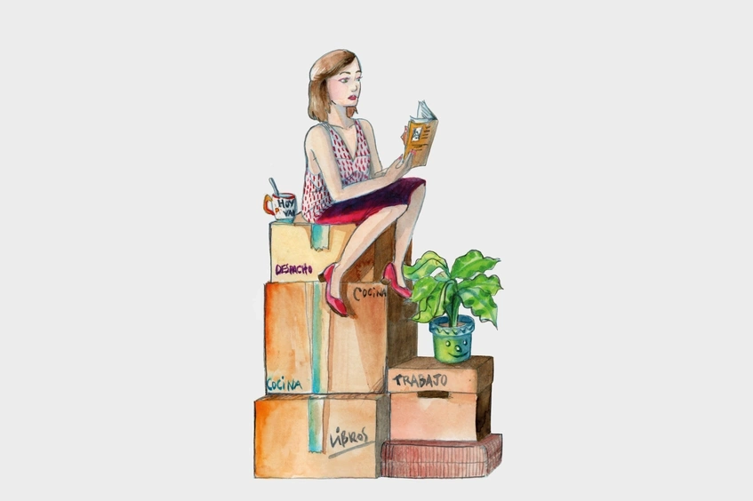 Mujer con cajas traslado vivienda